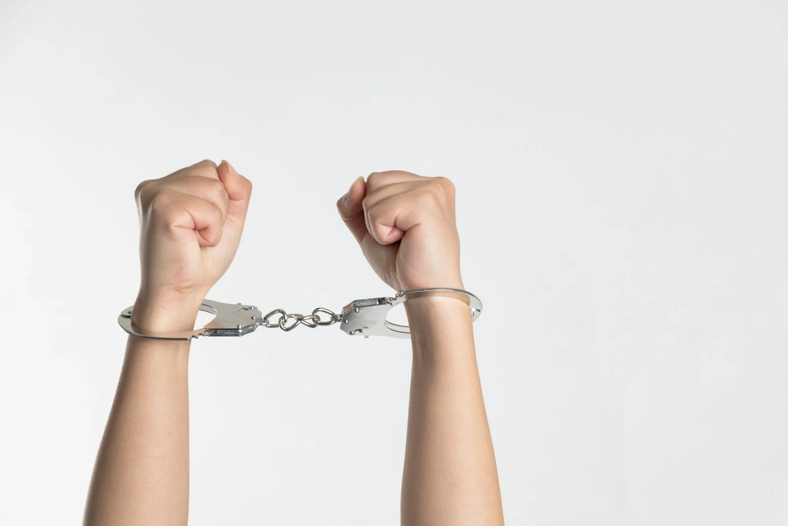 person showing handcuff